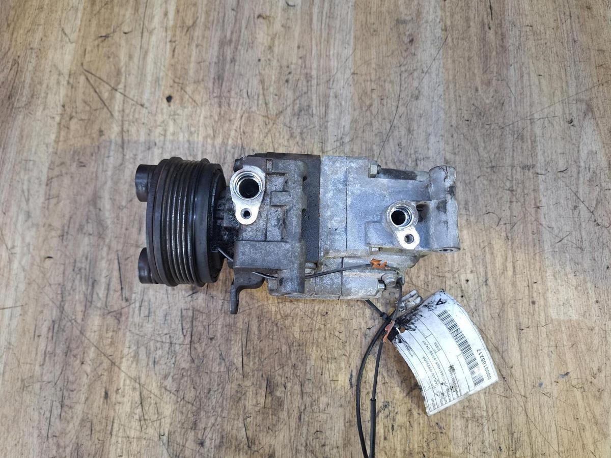 1000920897-A/C Compressor Top