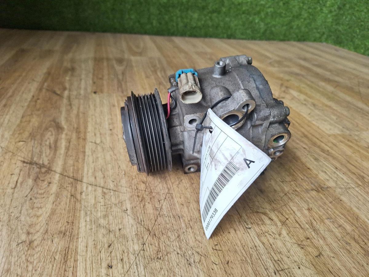 1000889736-A/C Compressor Top