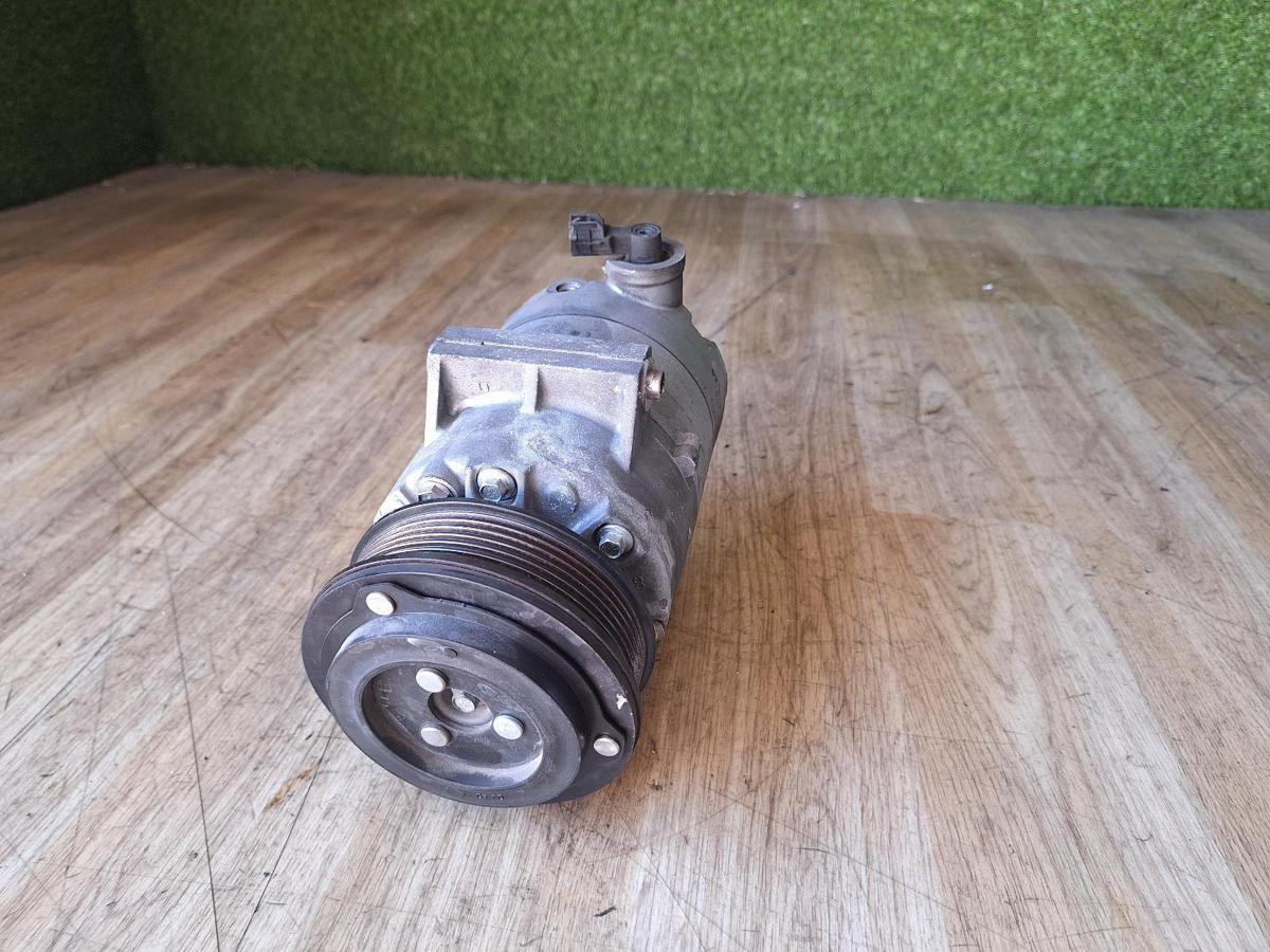 1000903185-A/C Compressor Top