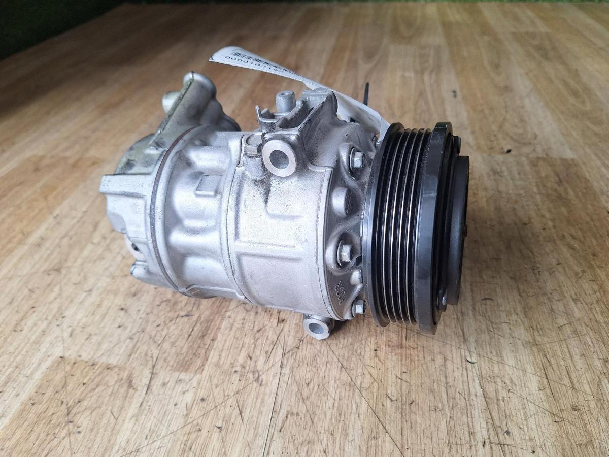1000904764-A/C Compressor Top