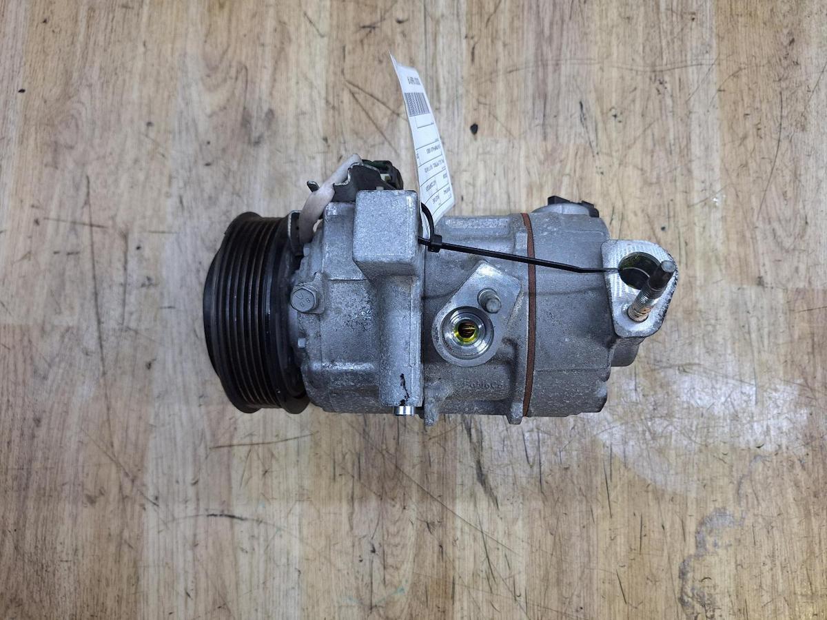 1000934486-A/C Compressor Top