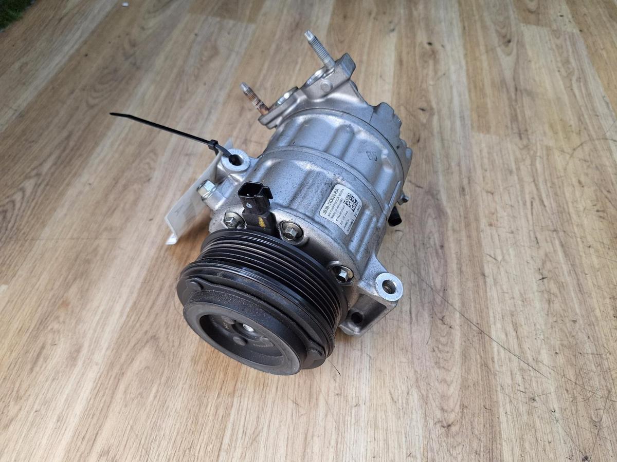 1000877054-A/C Compressor Top