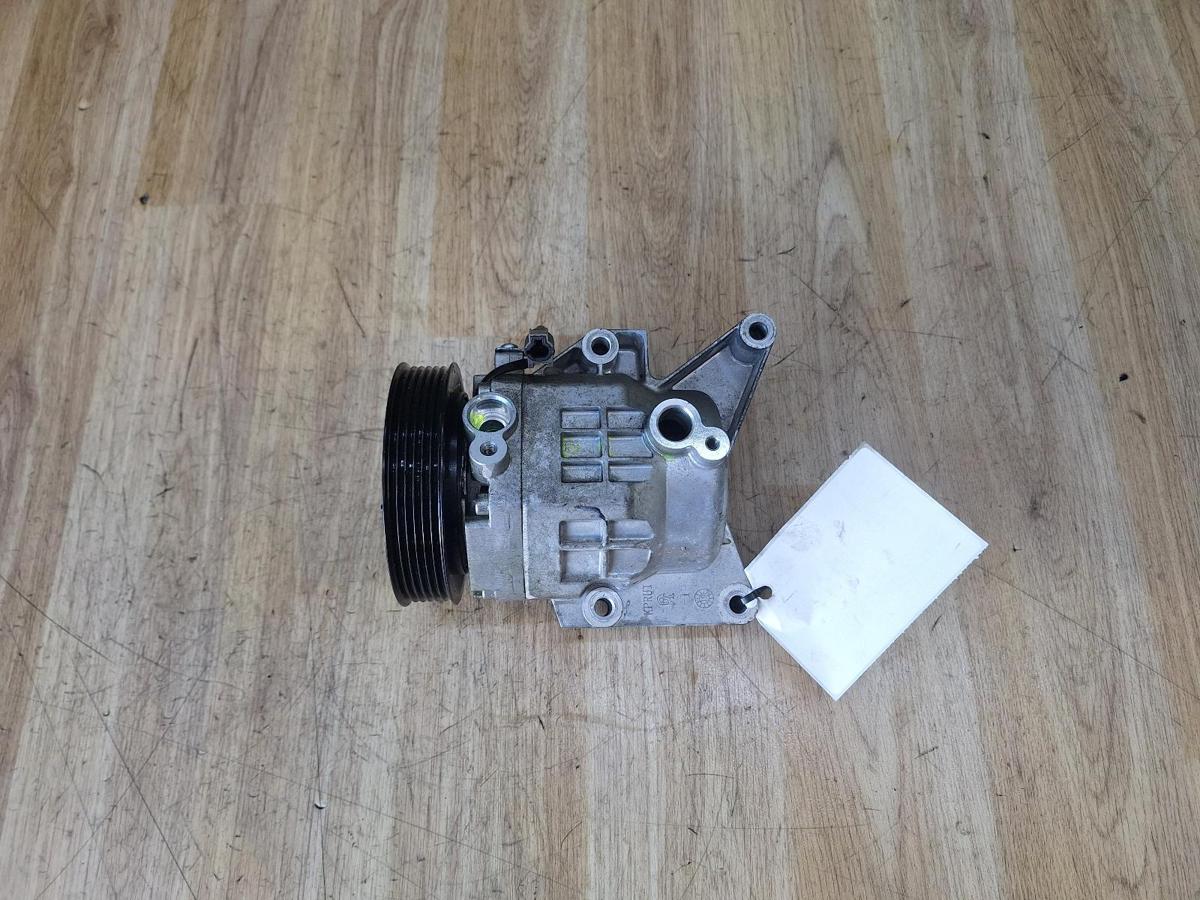 1000887488-A/C Compressor Top