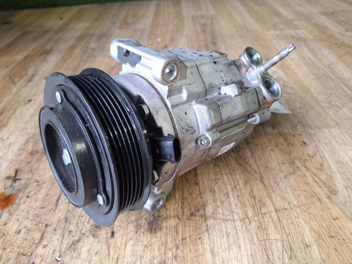 1000890235-A/C Compressor Top