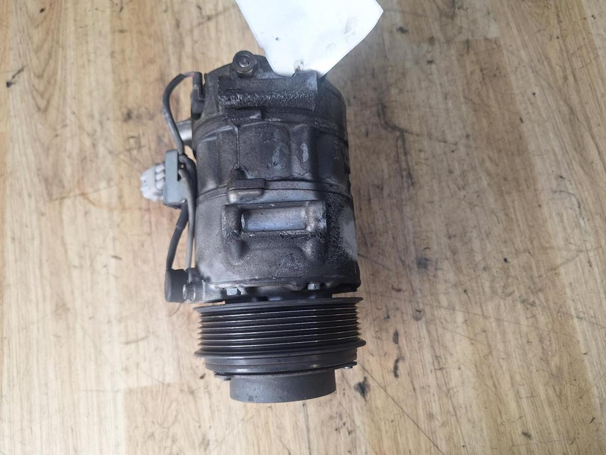 1000894324-A/C Compressor Top