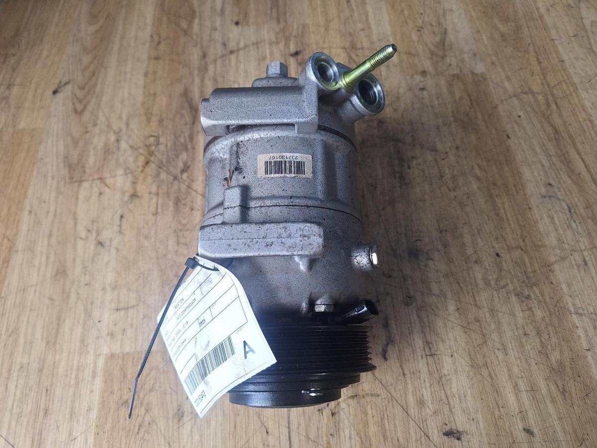 1000894946-A/C Compressor Top