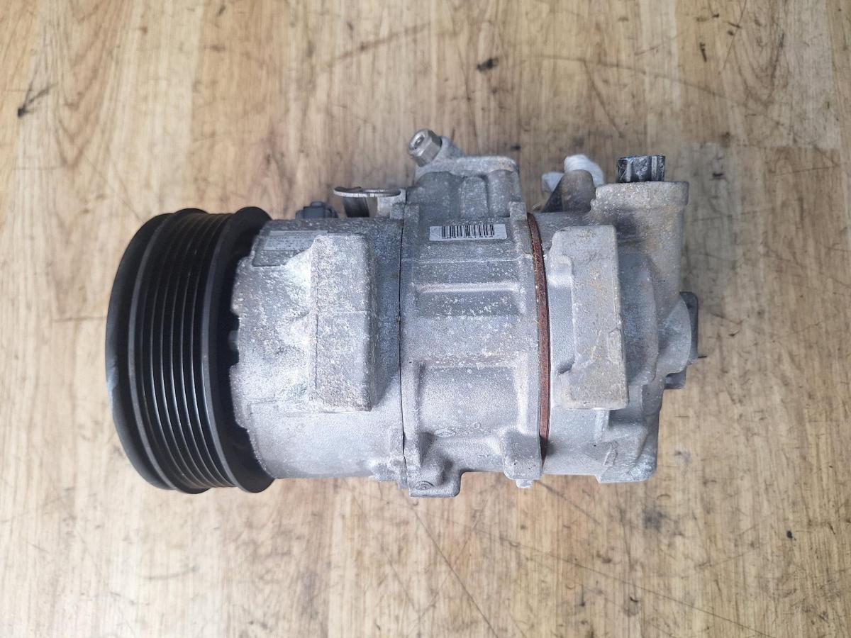 1000896309-A/C Compressor Top
