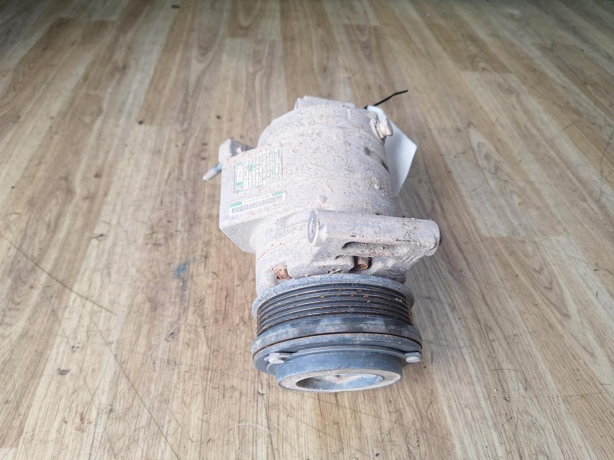 1000898432-A/C Compressor Top