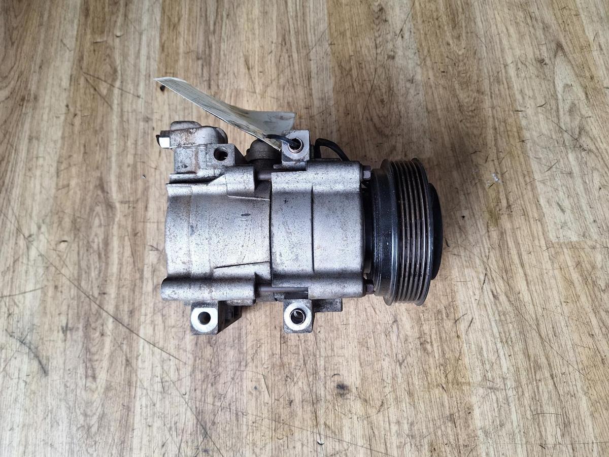 1000899282-A/C Compressor Top