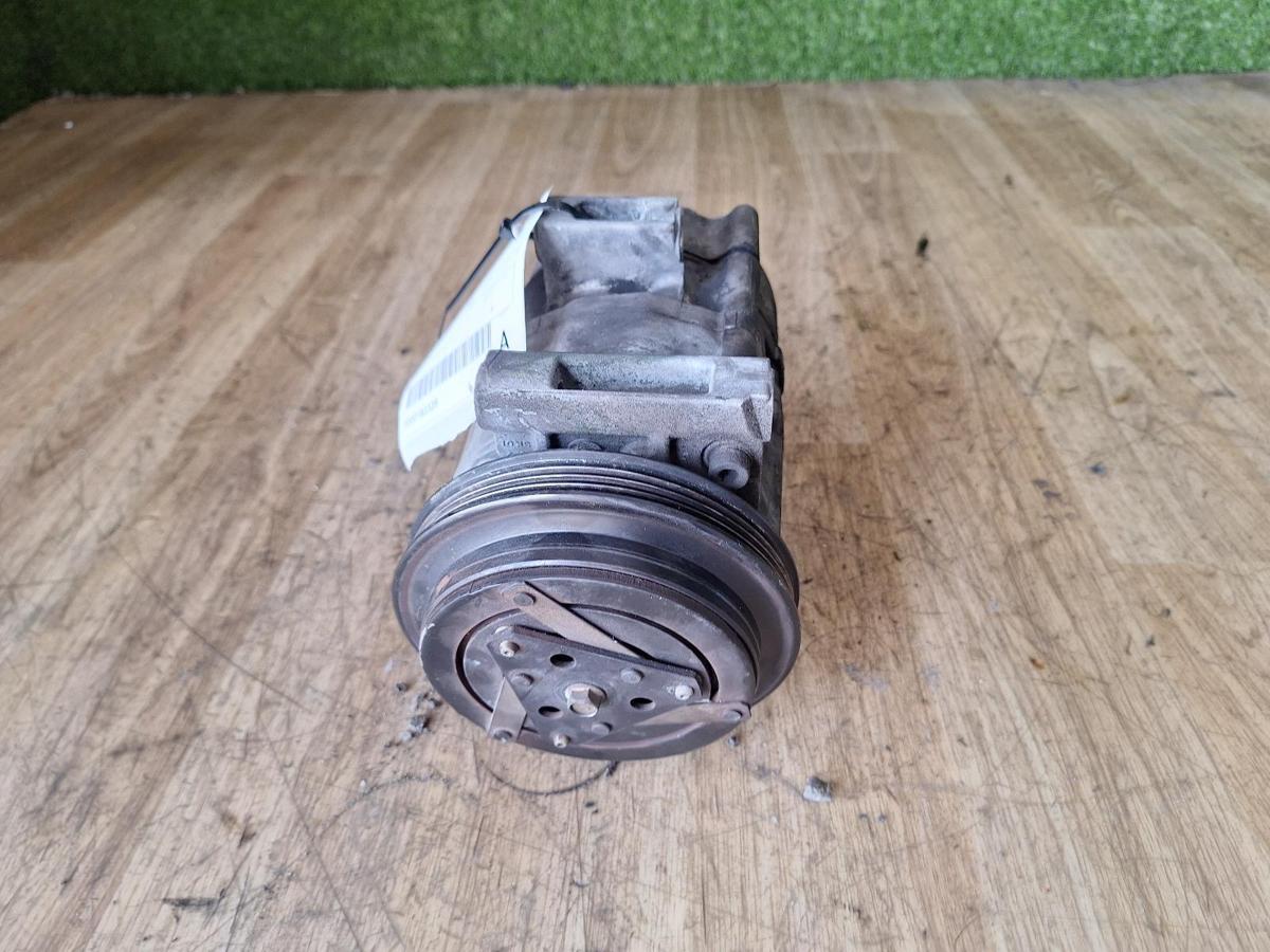 1000908504-A/C Compressor Top