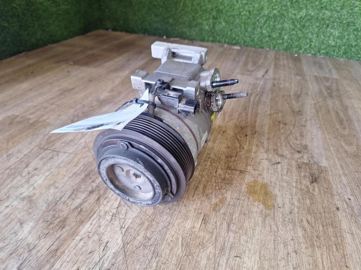 1000909378-A/C Compressor Top