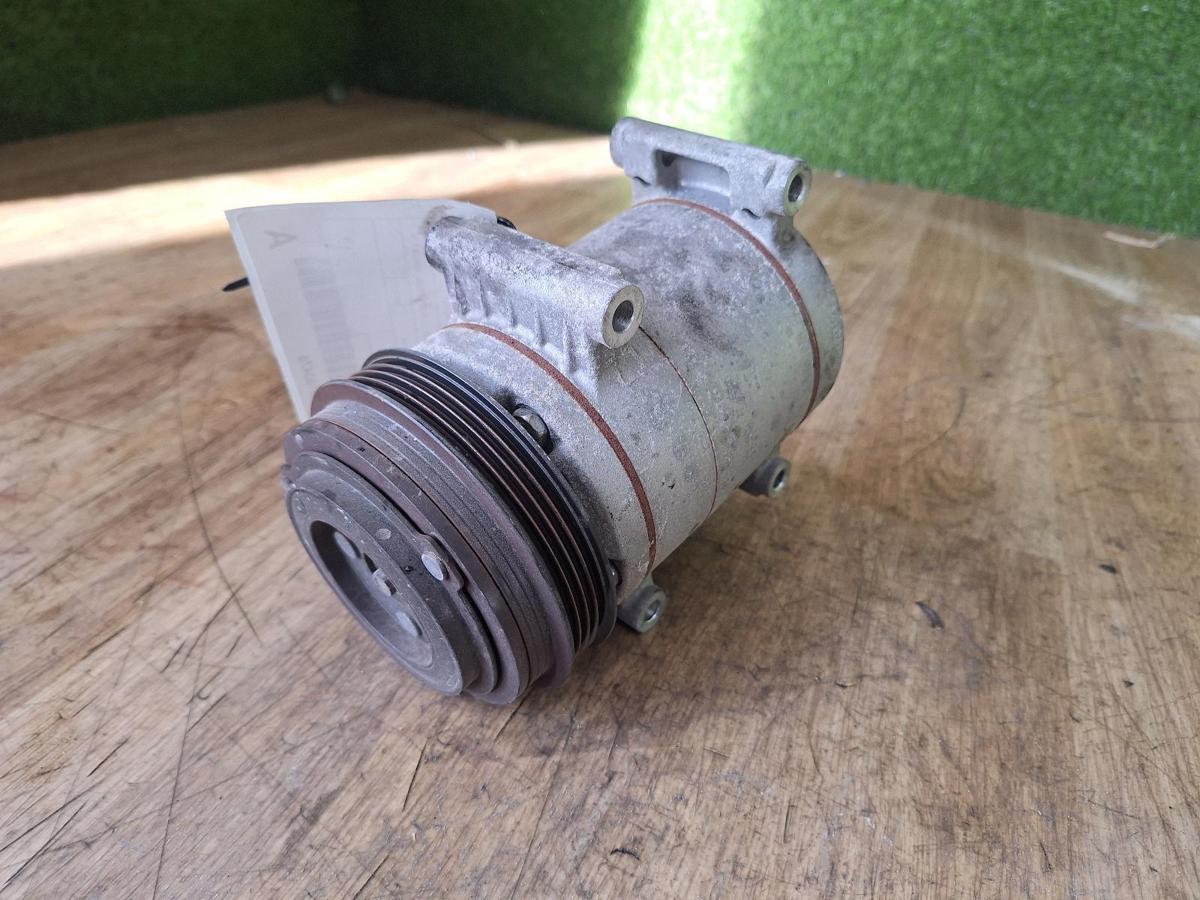 1000911968-A/C Compressor Top