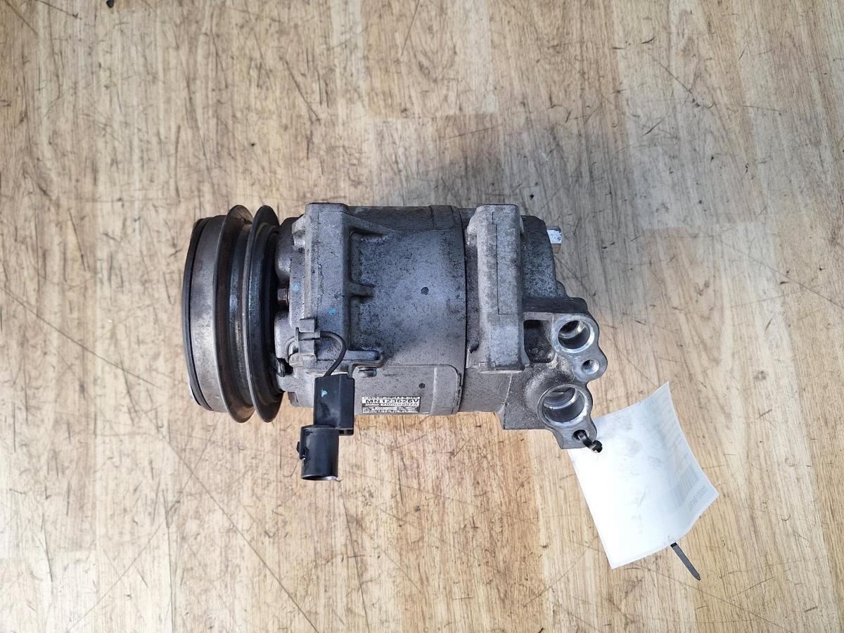 1000915275-A/C Compressor Top