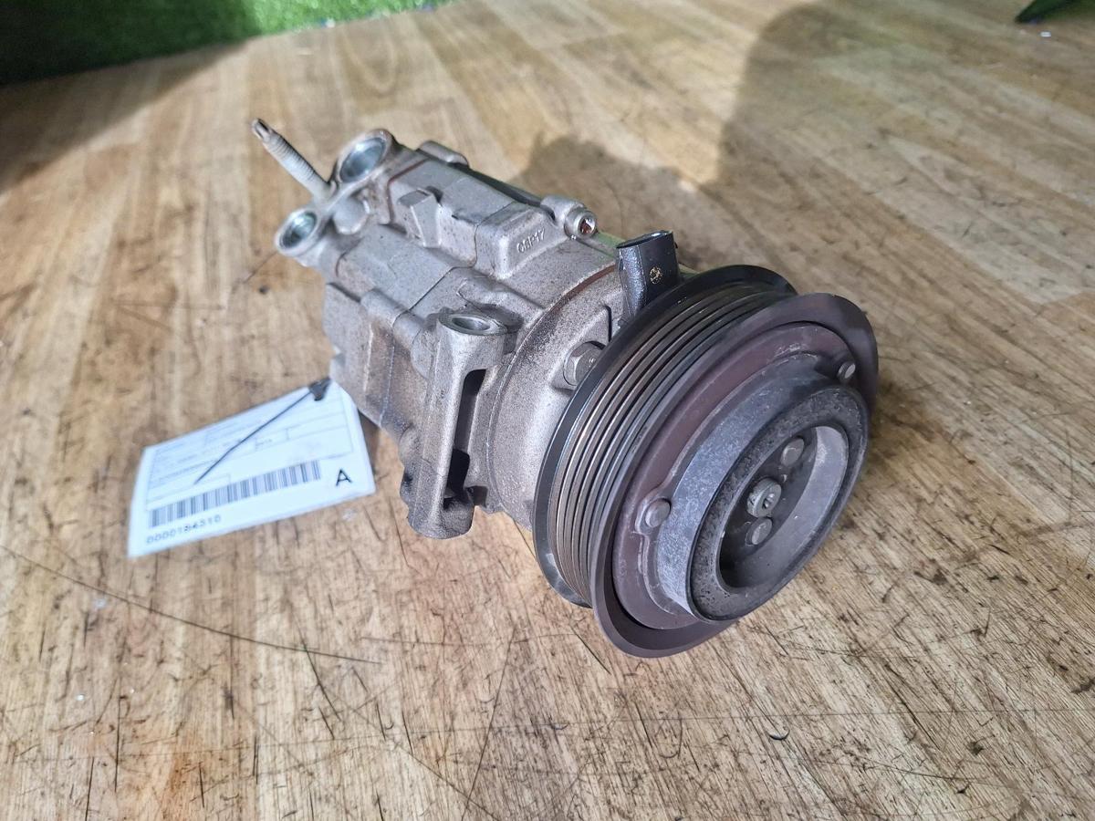 1000916889-A/C Compressor Top