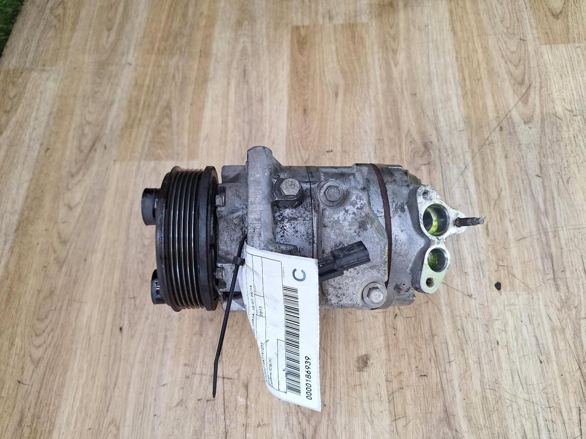 1000935010-A/C Compressor Top