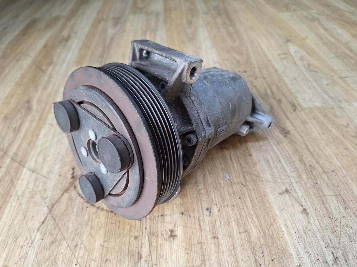 1000885360-A/C Compressor Top