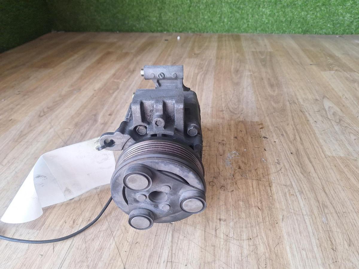1000897167-A/C Compressor Top
