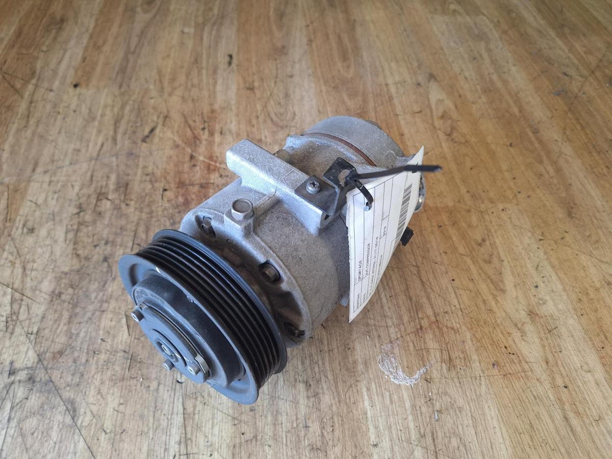 1000909503-A/C Compressor Top