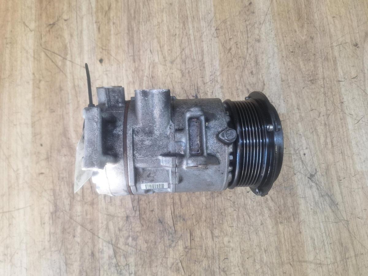 1000919675-A/C Compressor Top