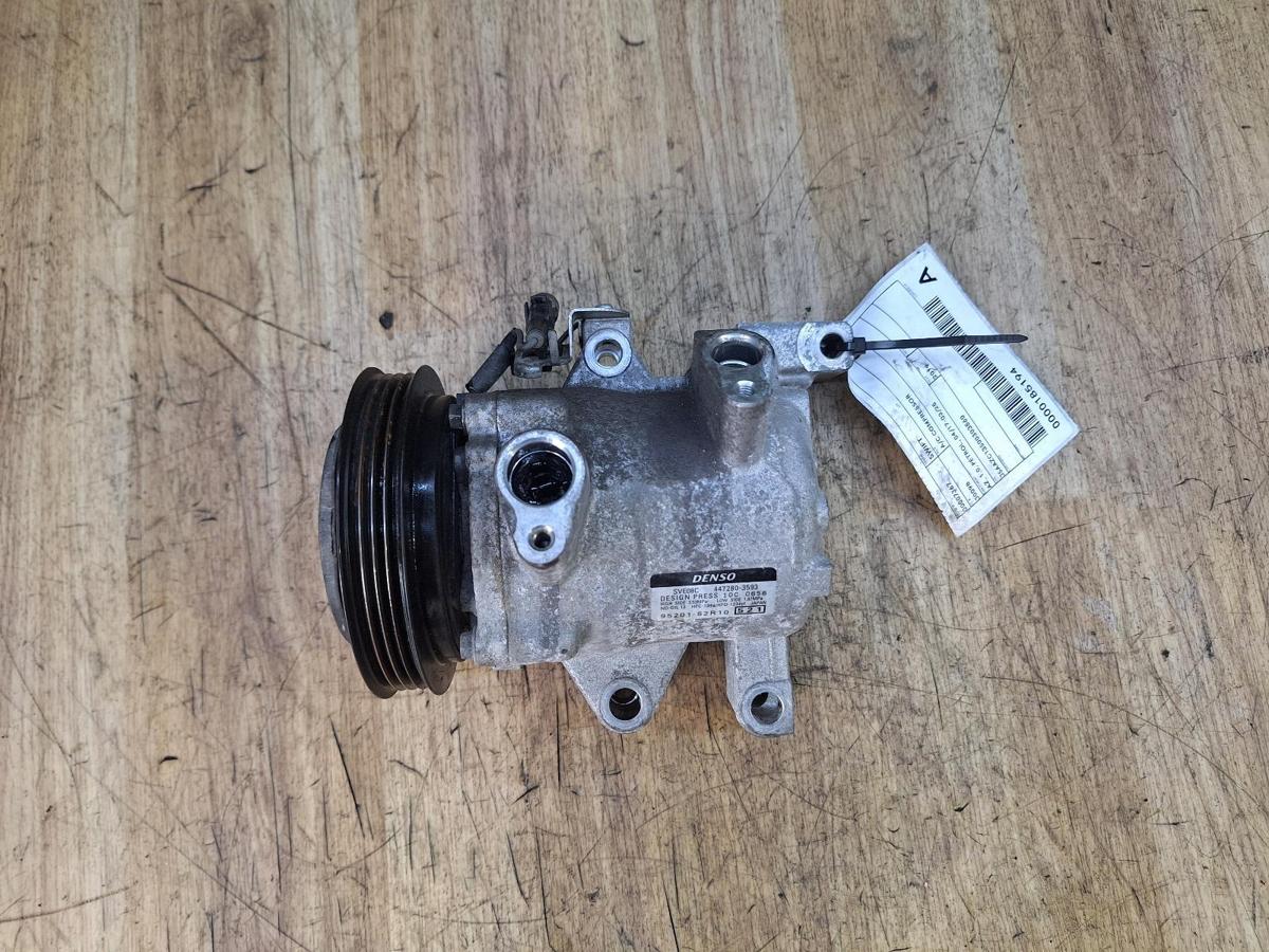 1000921162-A/C Compressor Top