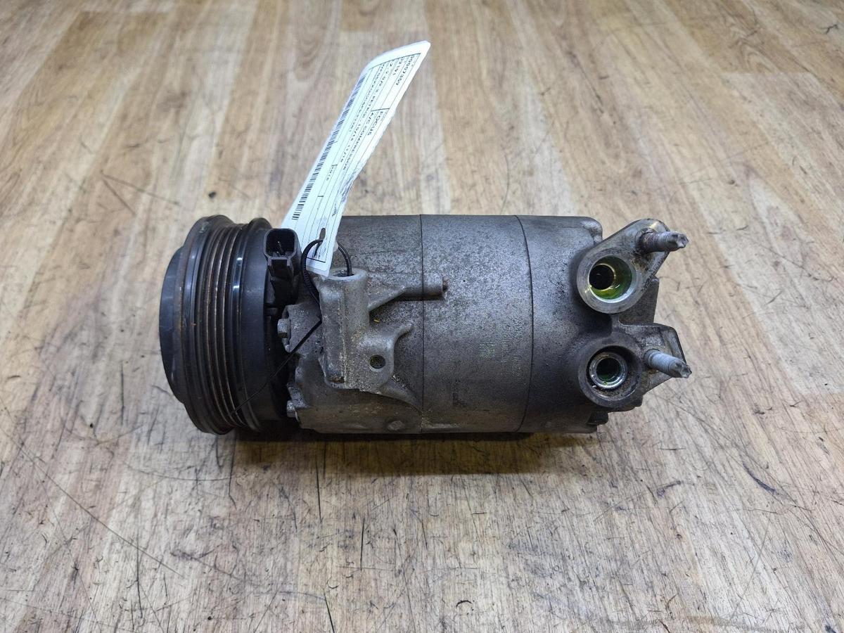 1000921279-A/C Compressor Top