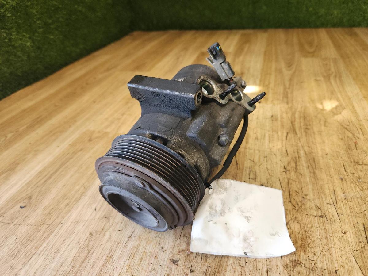 1000925609-A/C Compressor Top