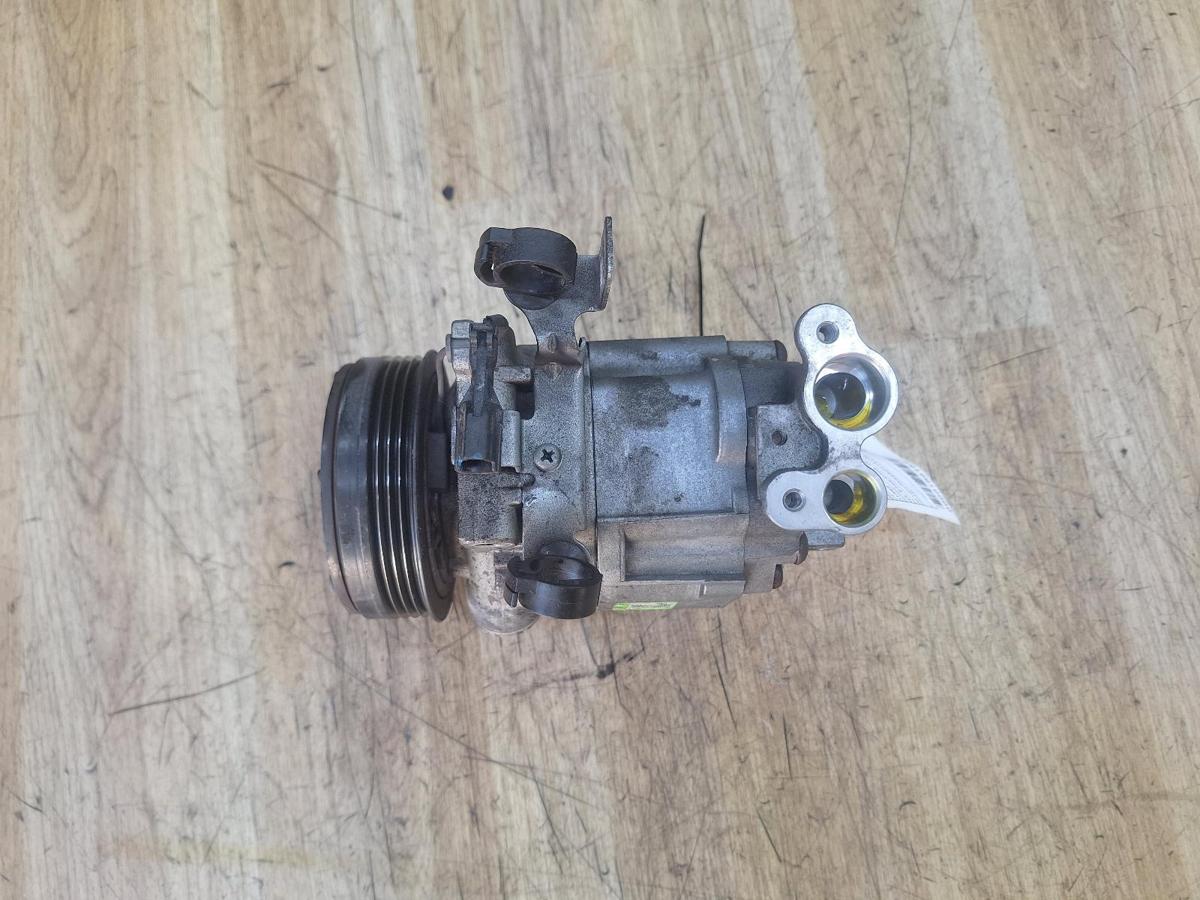 1000930817-A/C Compressor Top
