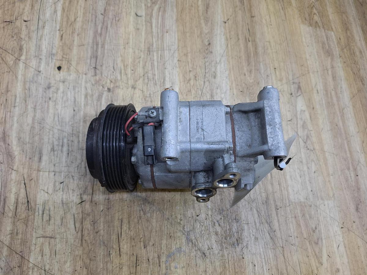 1000931225-A/C Compressor Top