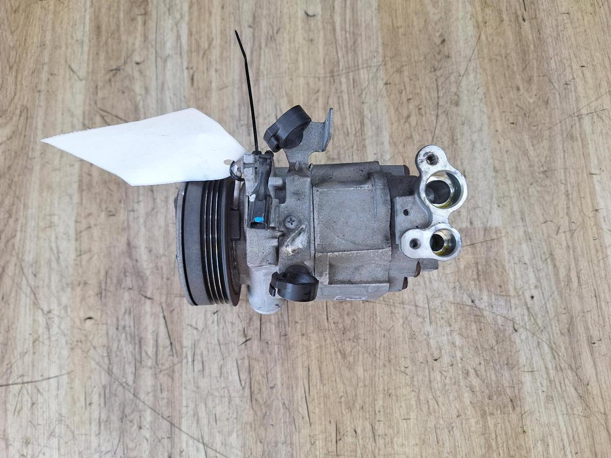 1000931530-A/C Compressor Top