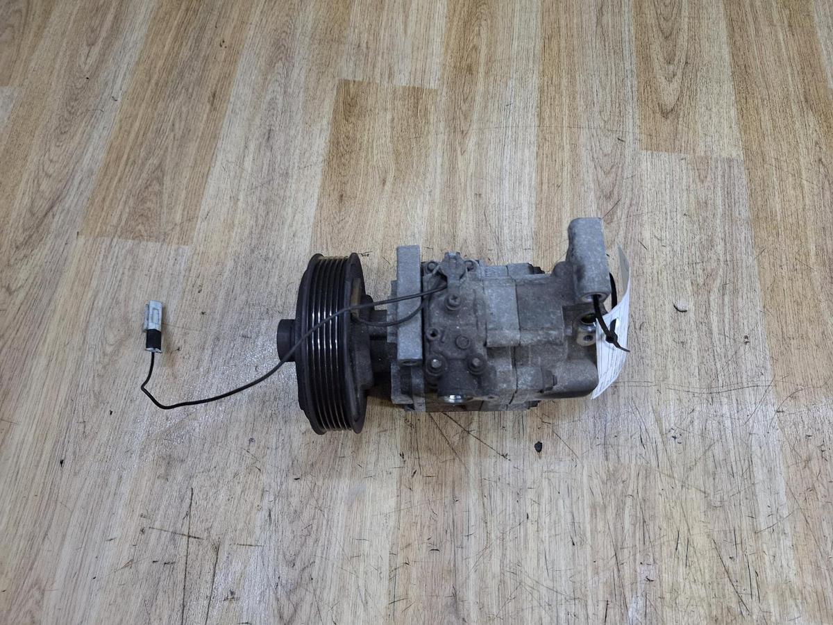 1000933552-A/C Compressor Top
