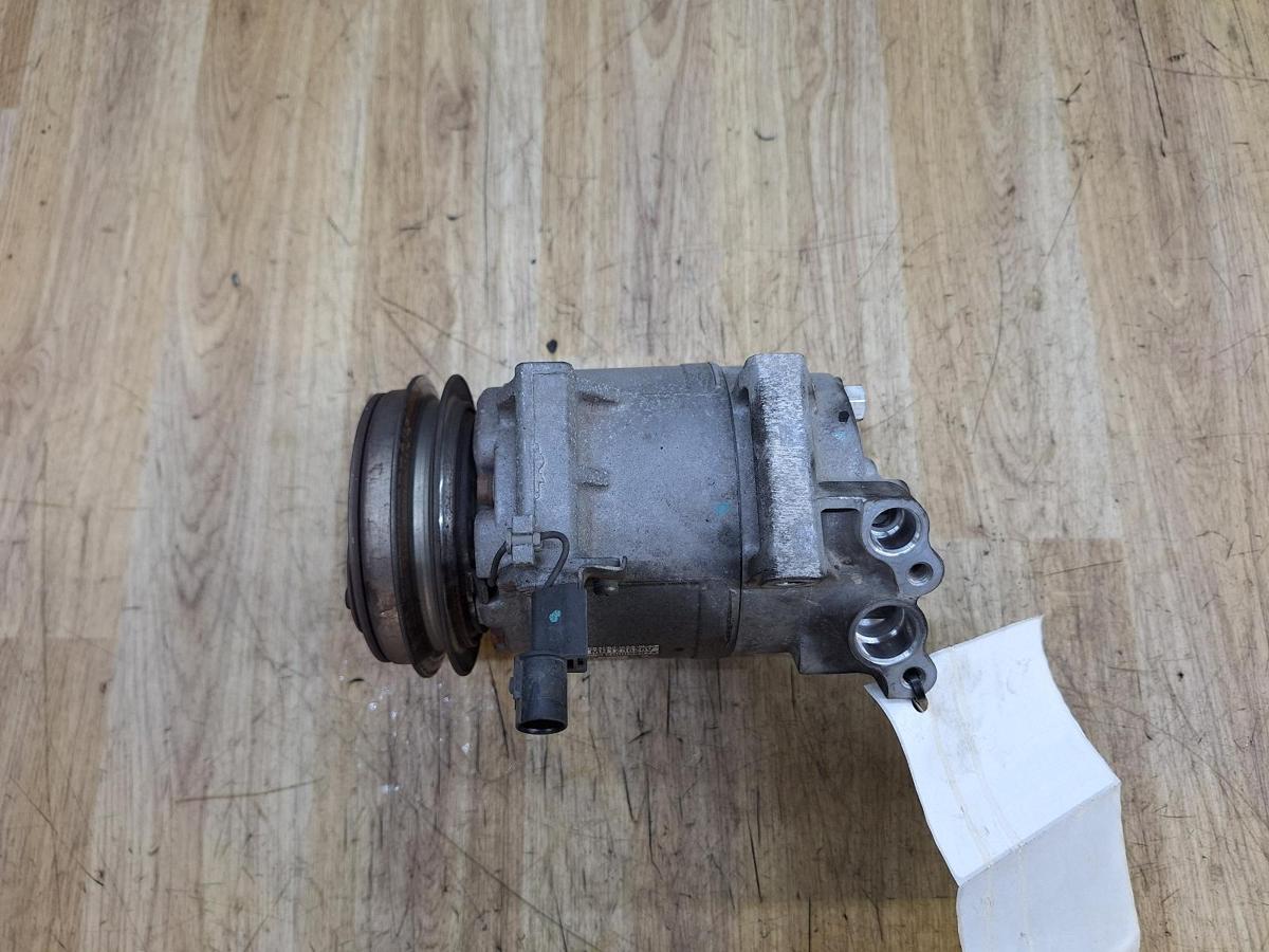 1000935426-A/C Compressor Top