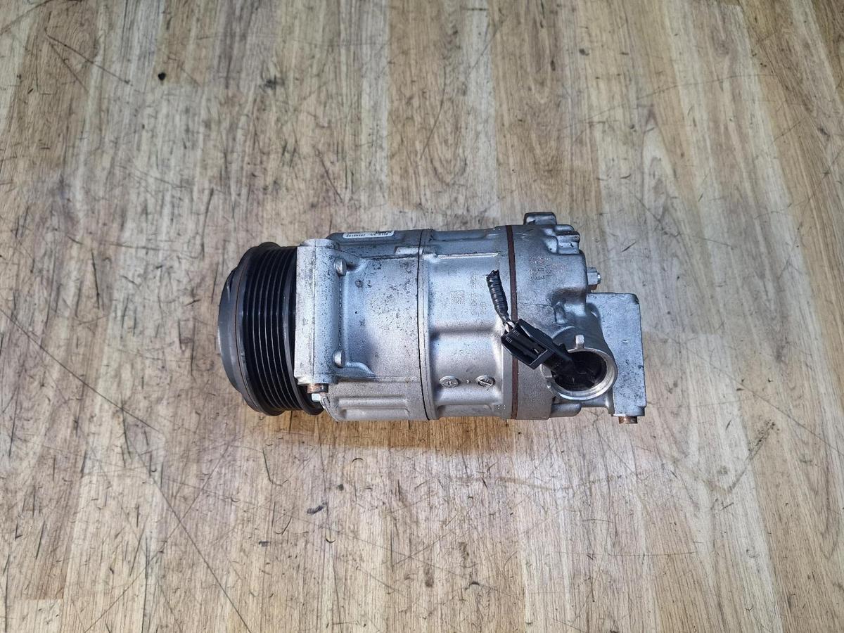 1000933942-A/C Compressor Top