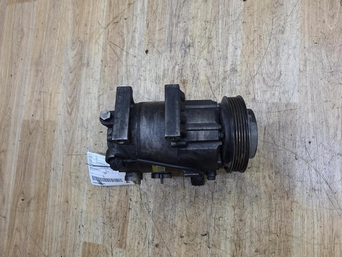 1000935143-A/C Compressor Top