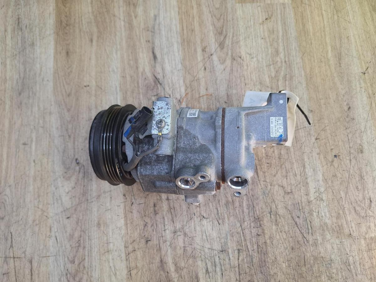 1000935281-A/C Compressor Top