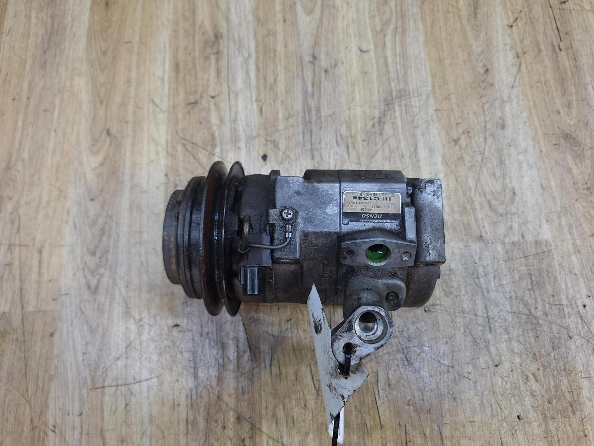 1000936171-A/C Compressor Top
