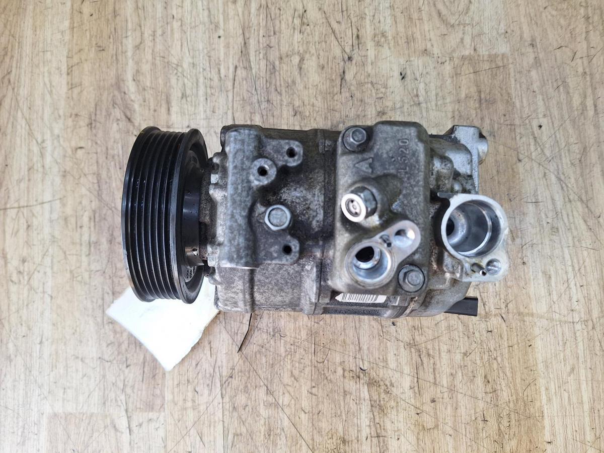 1000916297-A/C Compressor Top