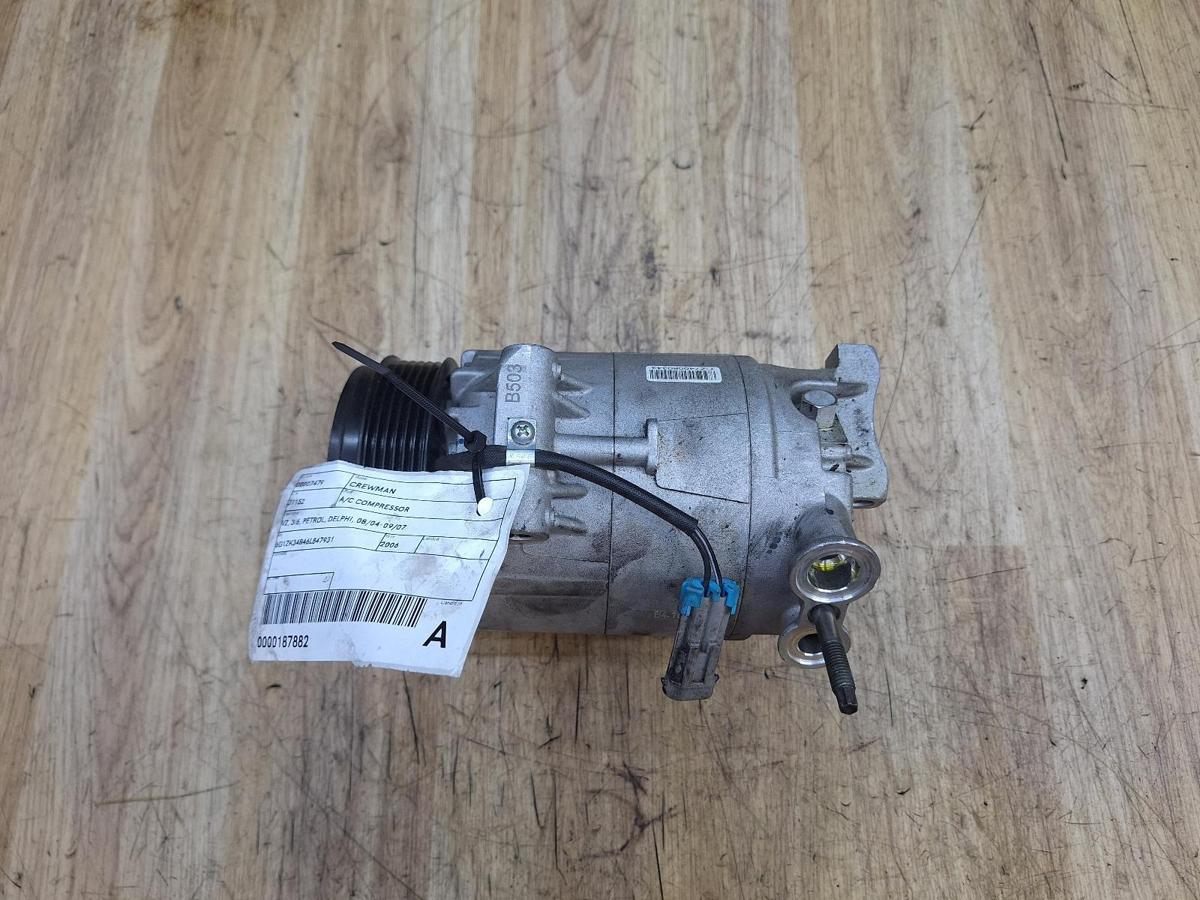 1000936476-A/C Compressor Top