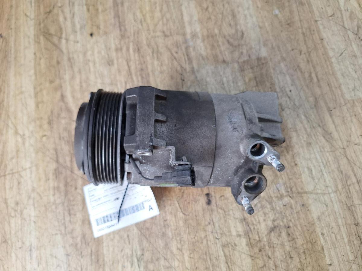 1000945167-A/C Compressor Top