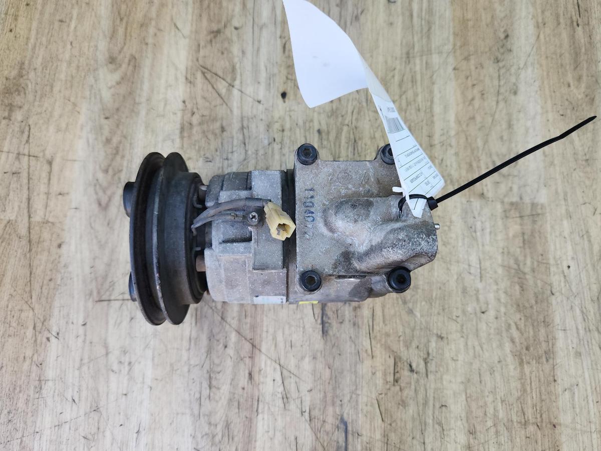 1000927675-A/C Compressor Top