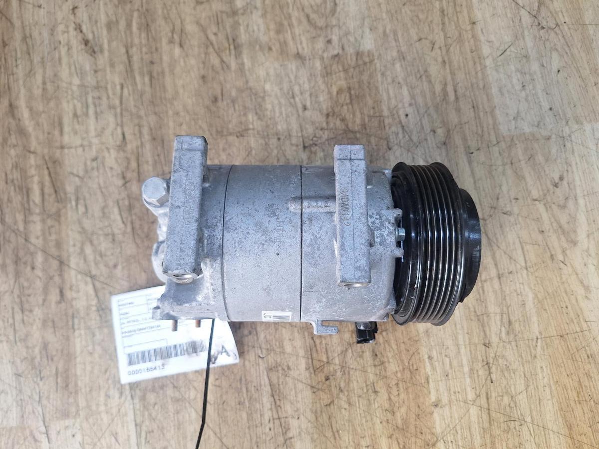 1000941064-A/C Compressor Top