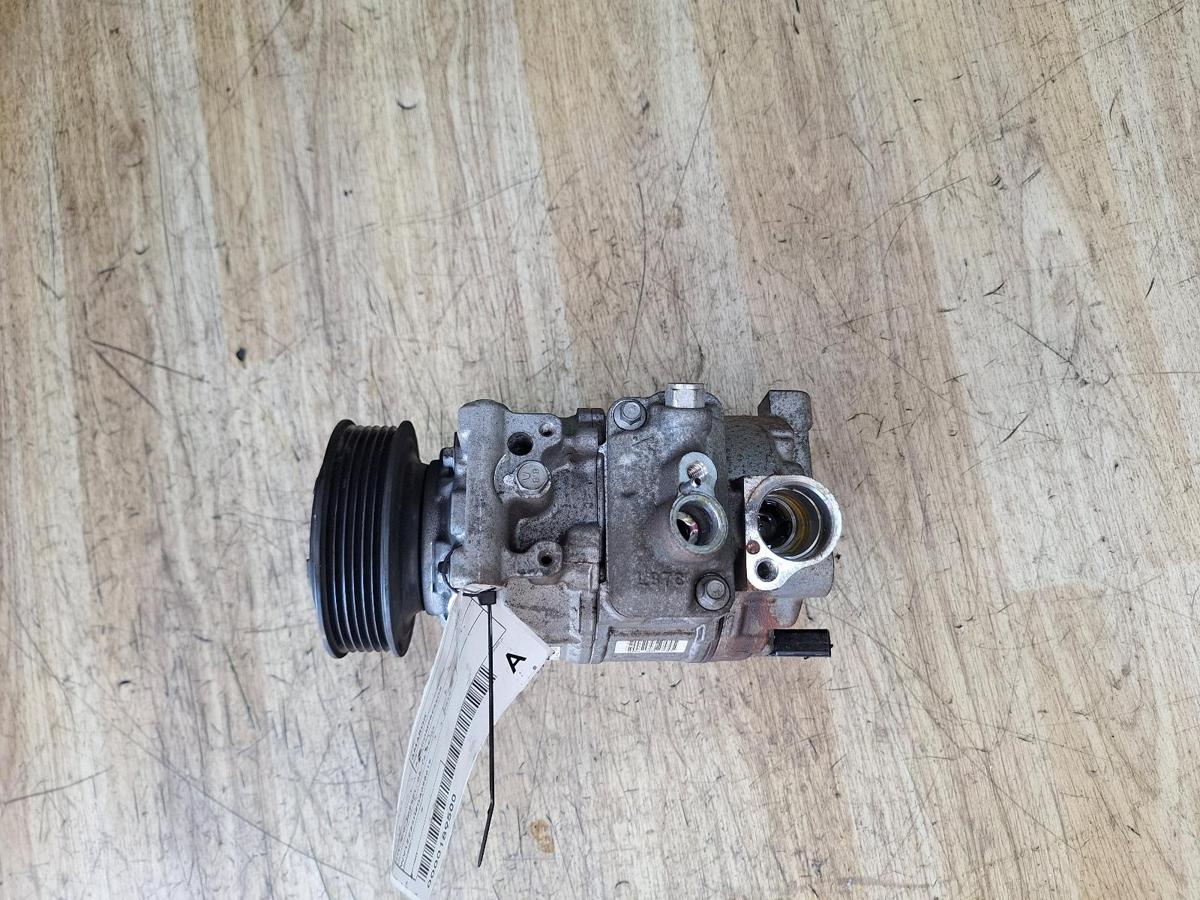 1000951616-A/C Compressor Top