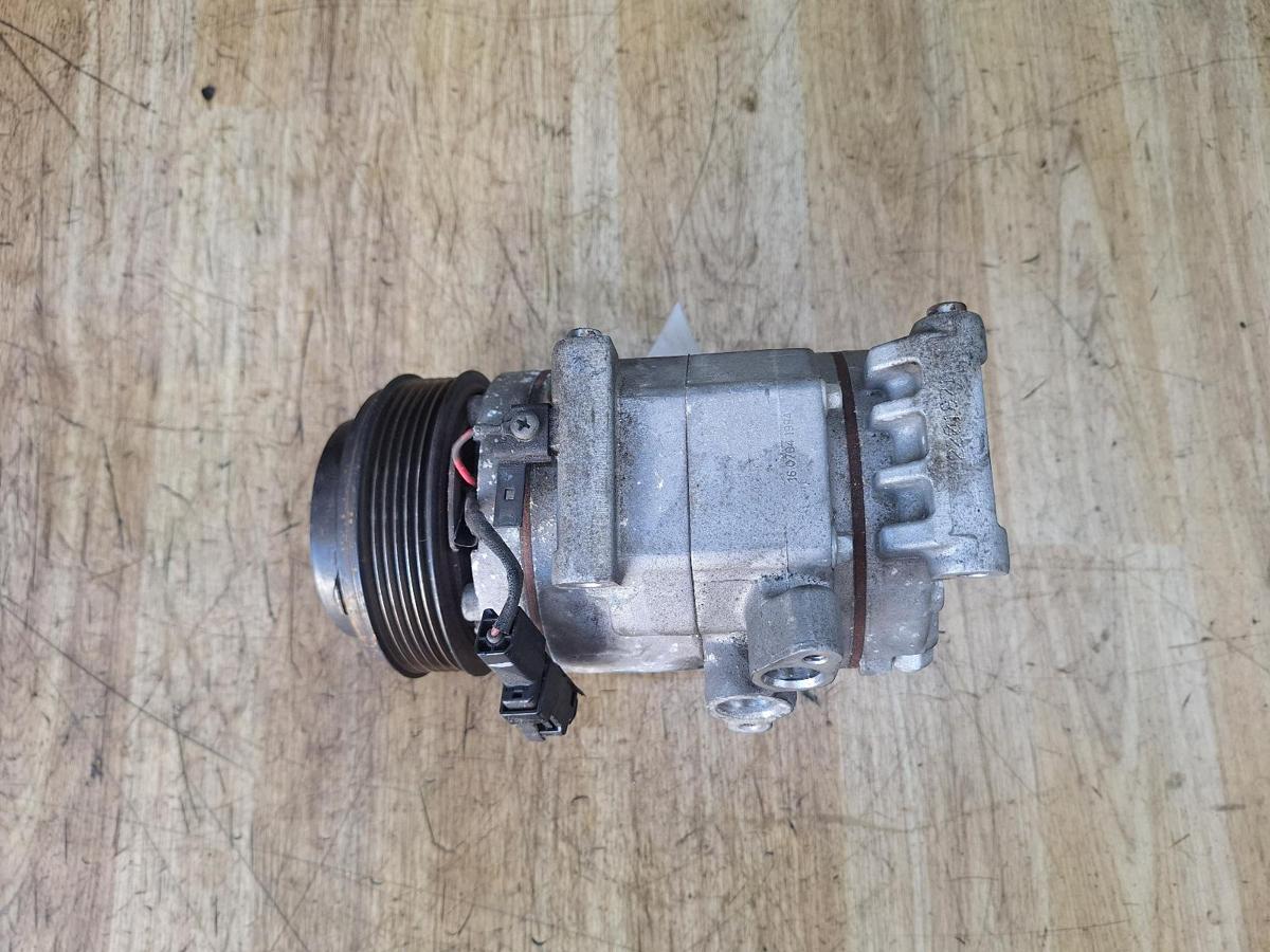 1000948163-A/C Compressor Top