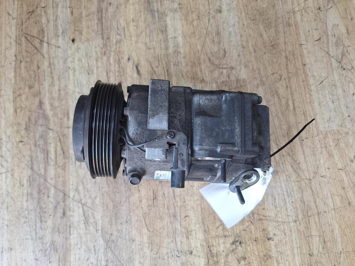 1000950569-A/C Compressor Top