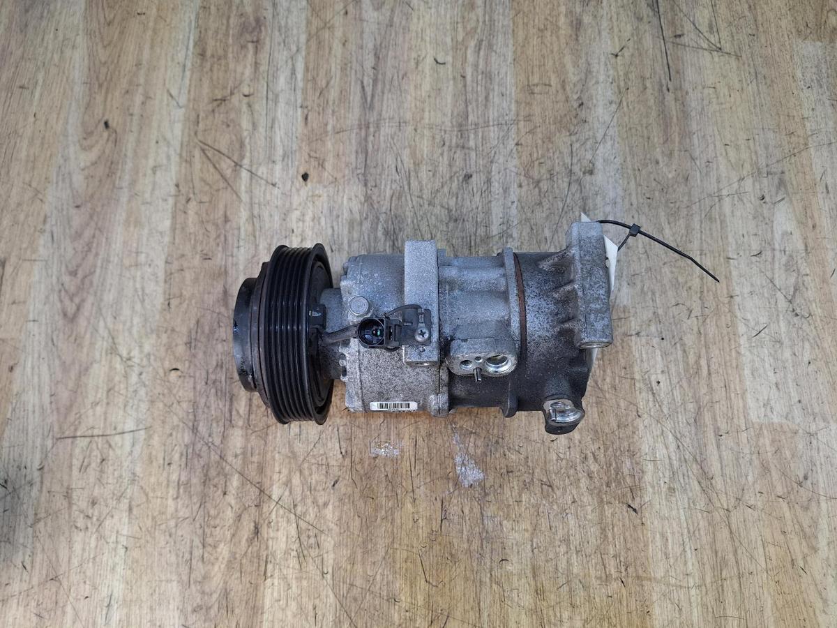 1000949352-A/C Compressor Top