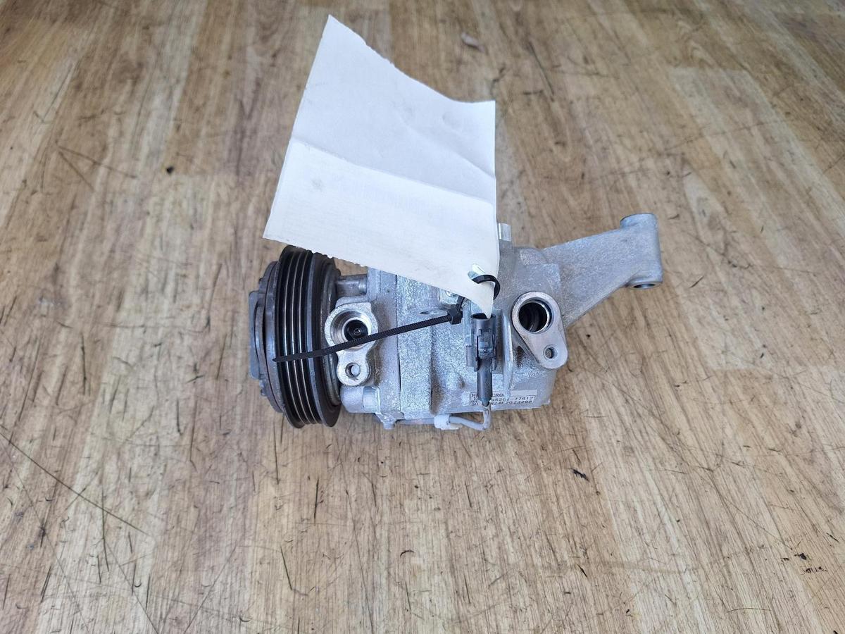 1000949477-A/C Compressor Top