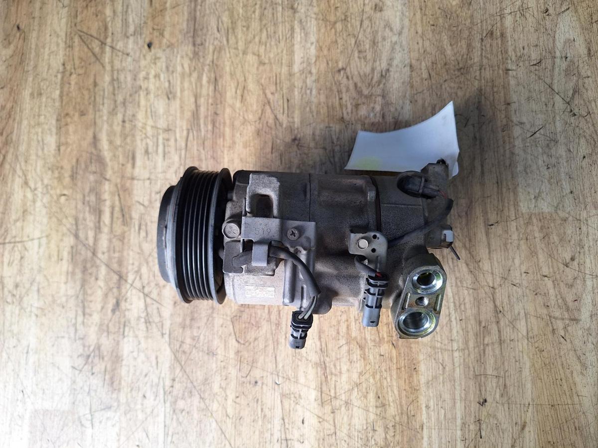 1000956166-A/C Compressor Top