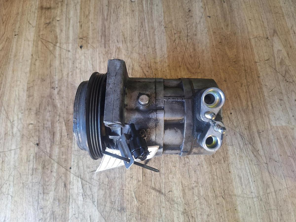 1000913116-A/C Compressor Top