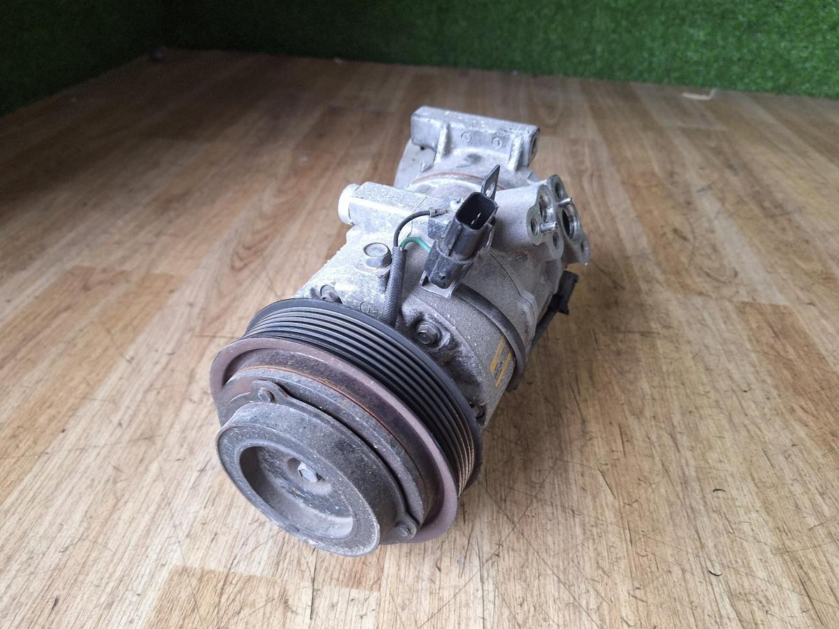 1000911718-A/C Compressor Top