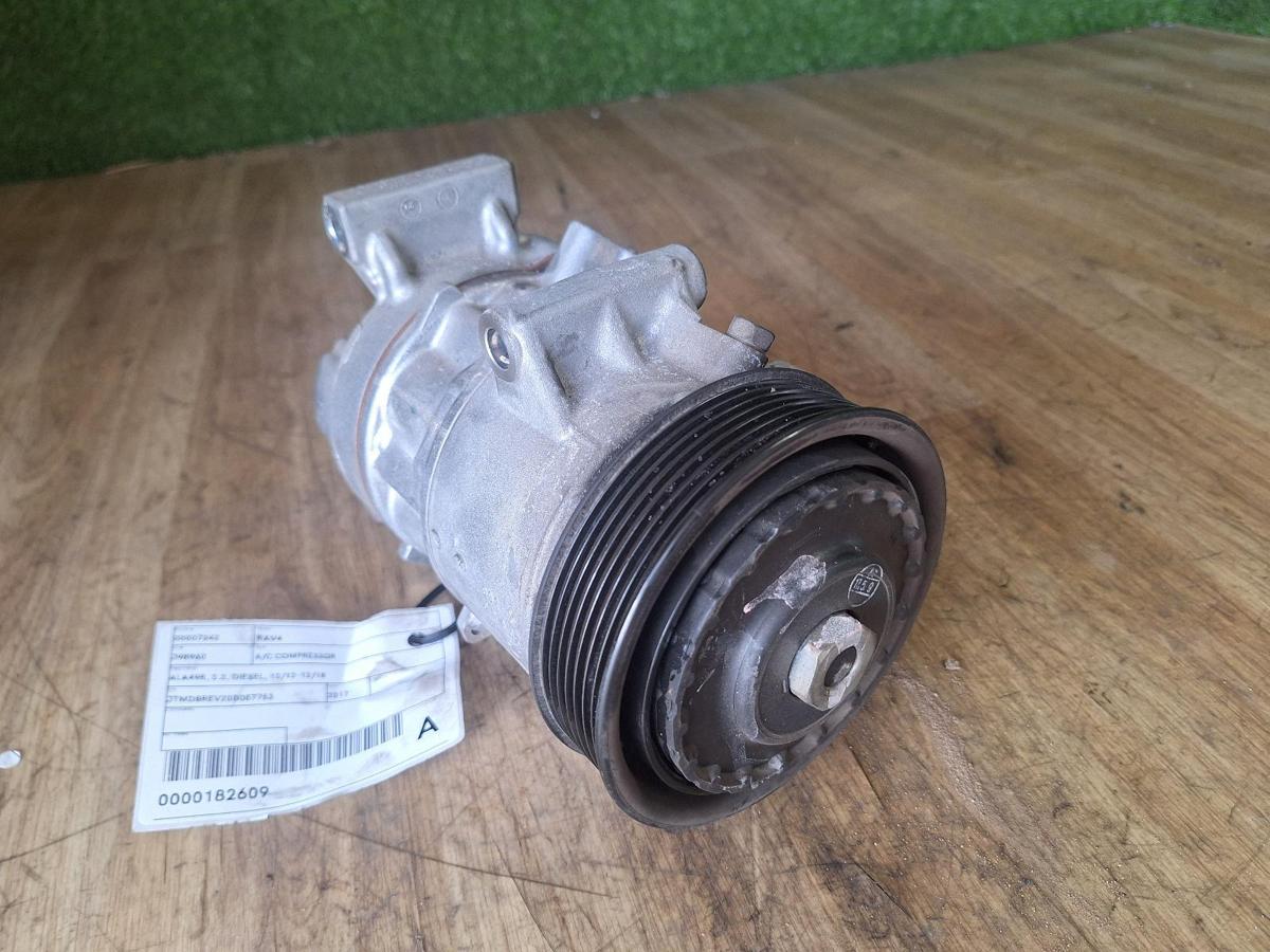 1000906830-A/C Compressor Top