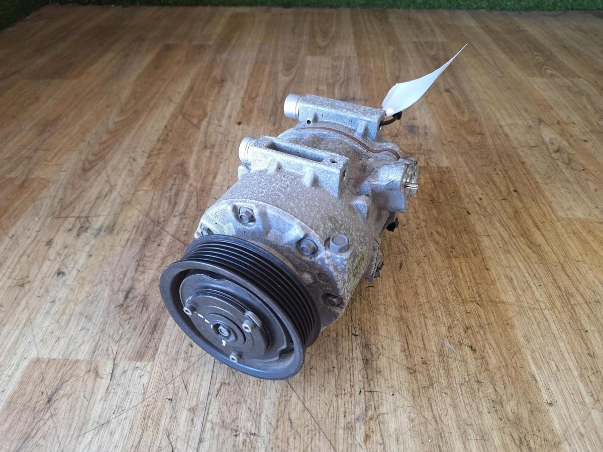 1000906069-A/C Compressor Top